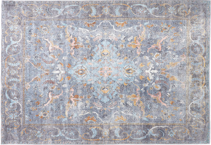 antique style rug in subtle blues