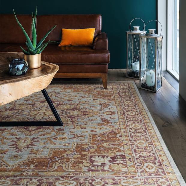 classic medallion rug in brown and rust tones in living room