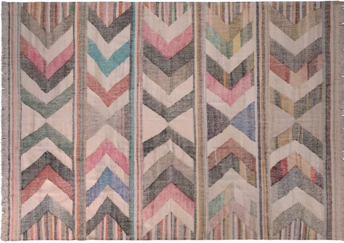 A multi colored chevron patterned rug