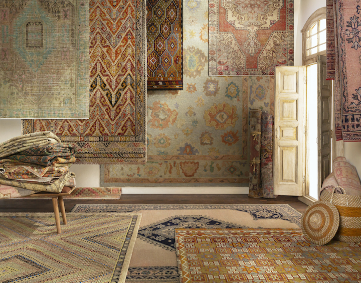 a display of one of a kind area rugs