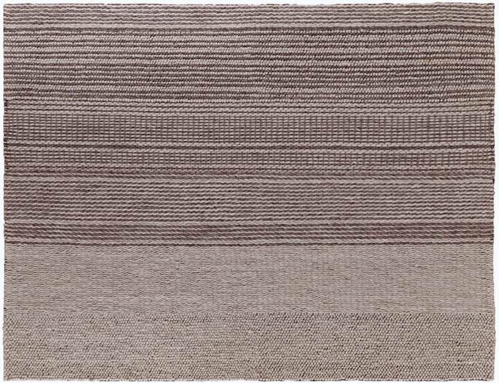 a linear style brown and beige rug by Thom Filicia