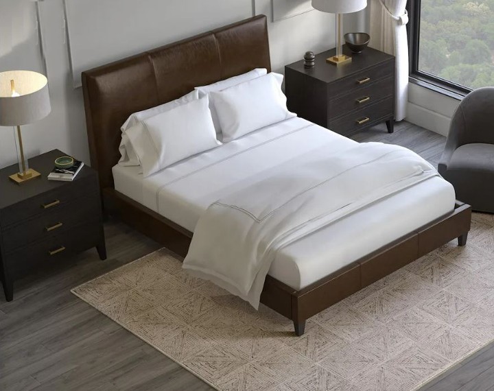 Saatva new area rug in bedroom setting