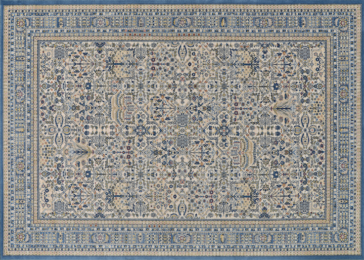 a classic rug motif in pale blues and ivories