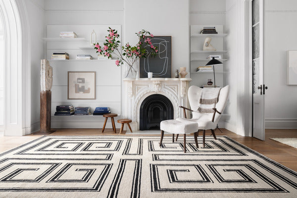 black and white greek keyhole rug from stark in living room scene