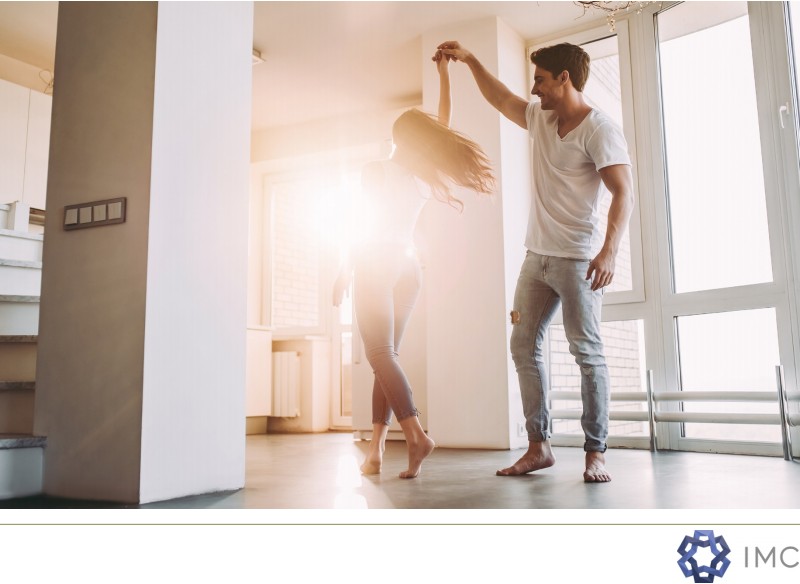 image of couple dancing at home