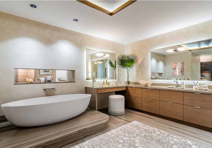 a luxe bathroom with area rug