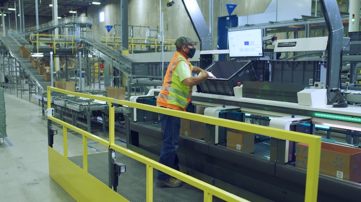 Walmart worker in new state of the art distribution center