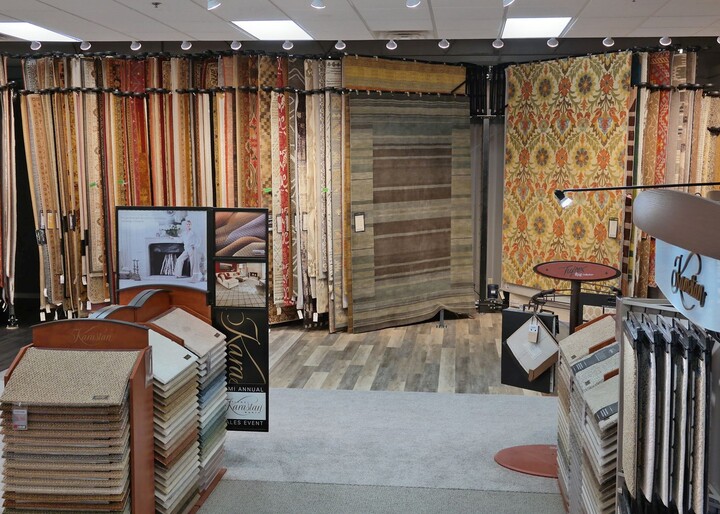 image of a flooring retailer's area rug display