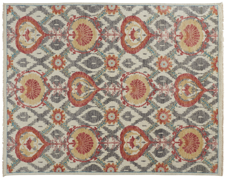 An arts and craft inspired rug with grey, gold and red accents