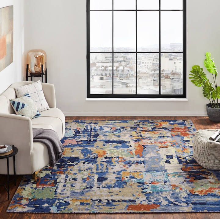 modern designed sumac style area rug in living room