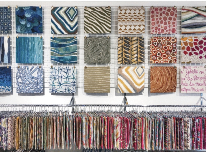 Image of textile and rug samples display