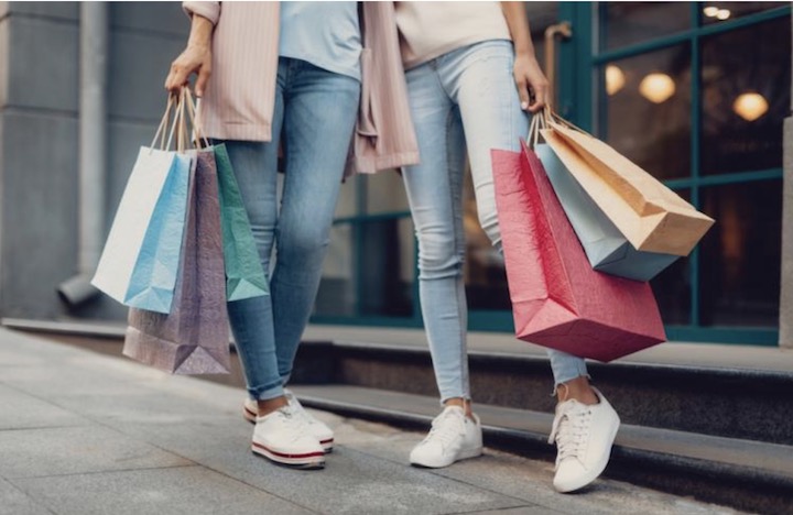 image of shoppers holding shopping bags