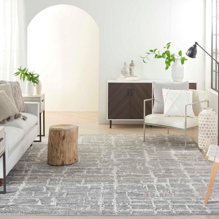 abstract gray and white rug in living room