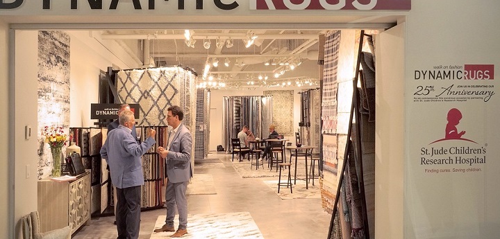 Two men standing in the entrance of a showroom