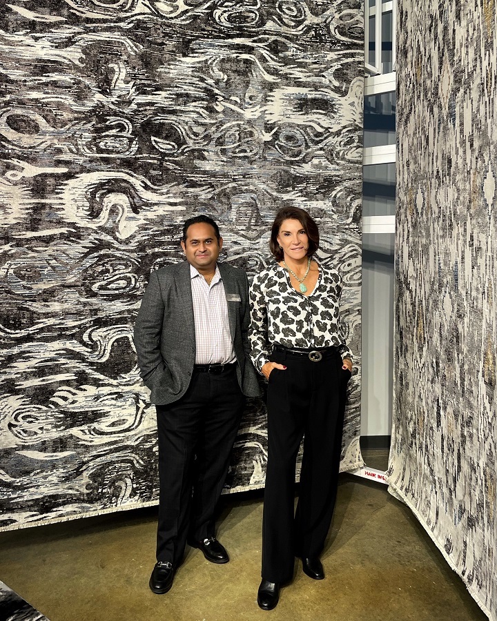 image of Monty Rathi and designer Hilary Farr with new rug designs