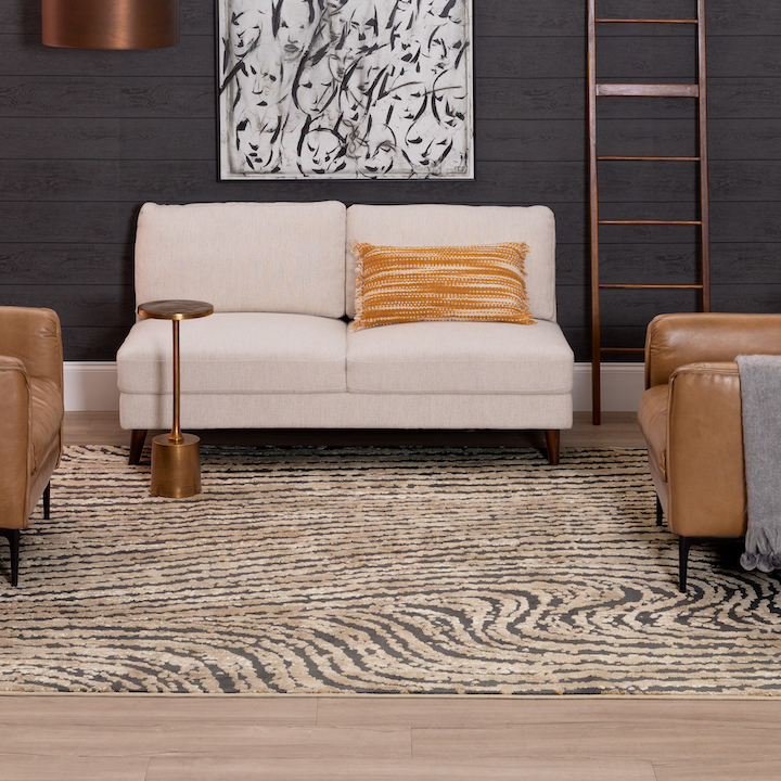 a modern undulating like area rug design in living room
