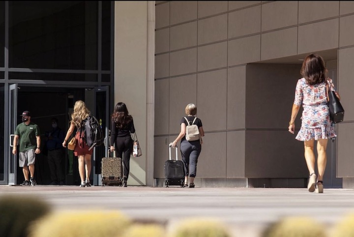 image of buyers enter market center