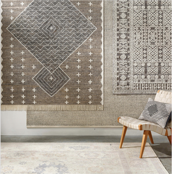 display of brown and beige performance rugs in various styles