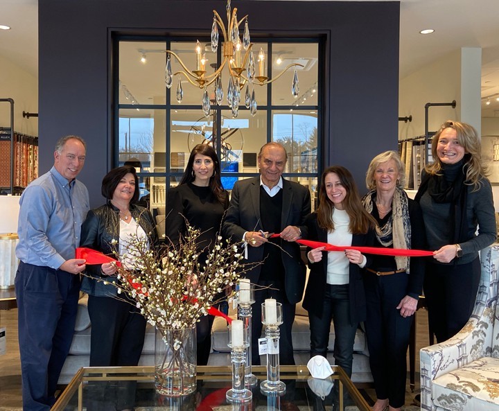 Ethan Allen team cut the ribbon at new store