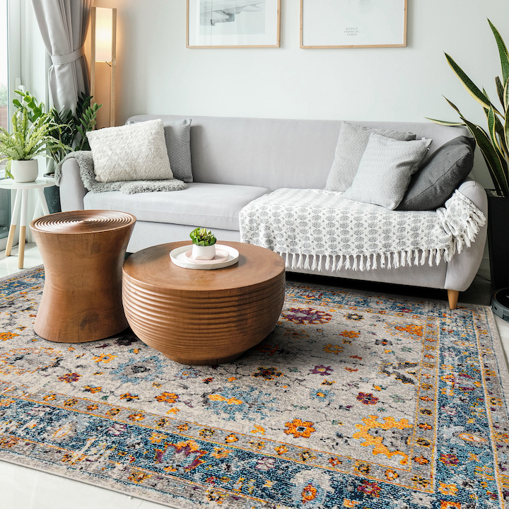 contemporary living room with an updated traditional design rug featuring pops of color