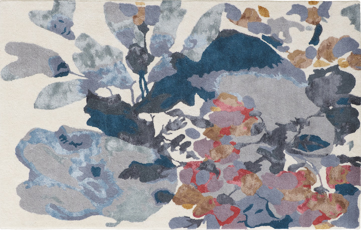a contemporary floral watercolor inspired area rug