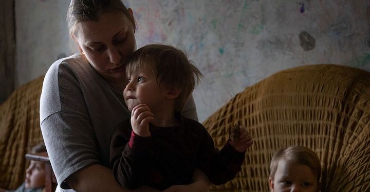 Ukraine mother and son impacted by the crisis with Russia