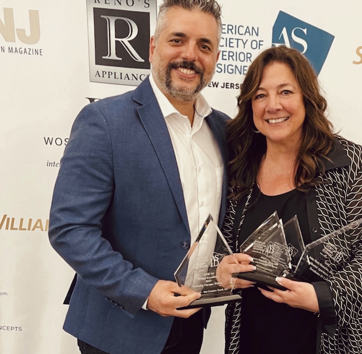 Baki Ildiz and Anna Mannarino posing with the ASID industry partners award