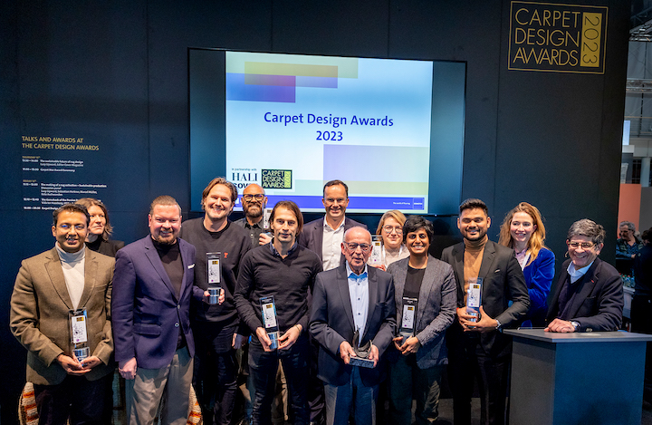 winners of the 2023 carpet design awards holding awards