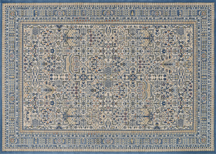 a classic rug motif in pale blues and ivories