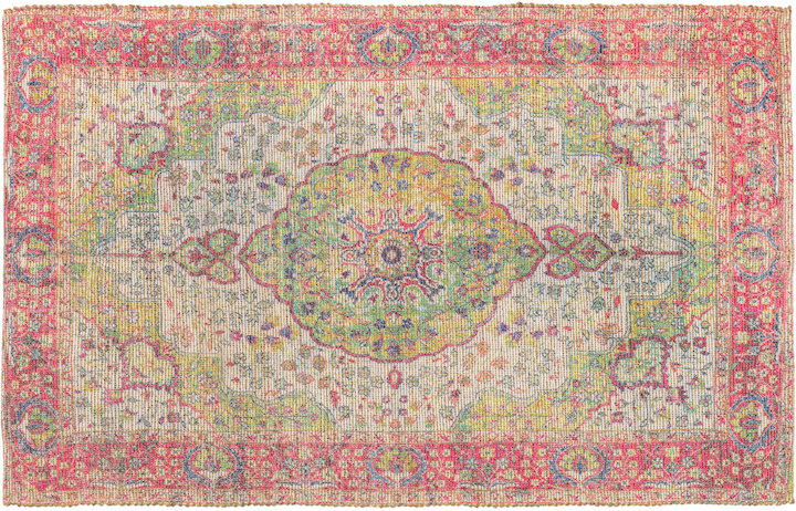 a medallion pattern rug in contemporary pink and green colorway